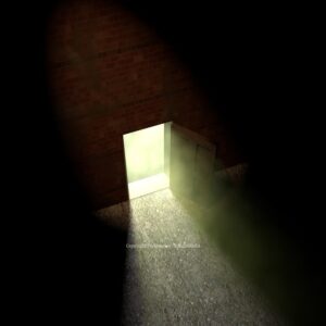 Closet (Coming Out) Graphics - an open door allows light into a dark room