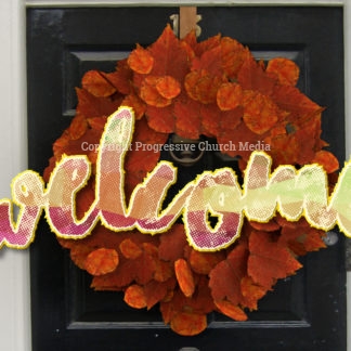 Fall Wreath Video - a front door with a welcoming wreath made of bright fall leaves