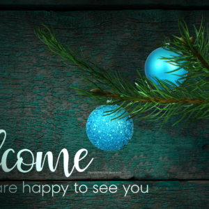 Country Christmas Video - Welcome message with Christmas ornaments hang against a backdrop of distressed old barn wood