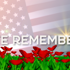 Memorial Day Worship Video. Designed for Memorial Day, the American flag flies over the middle of a field of red poppies.