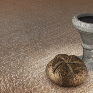 Holy Communion Graphics. A cup of wine and a loaf of bread sit ready on a table.