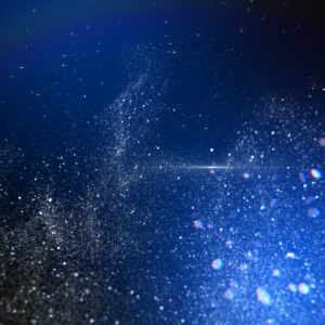 Holiday Glitter Graphics. Bursts of glitter against a wintery blue background.