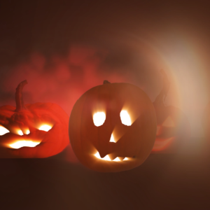 Pumpkin Faces Graphics. A collection a spooky jack-o-lanterns on a dark, foggy night.