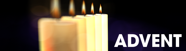 A row of white candles, lit for Advent