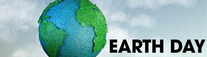 A globe made of green and blue leaves.