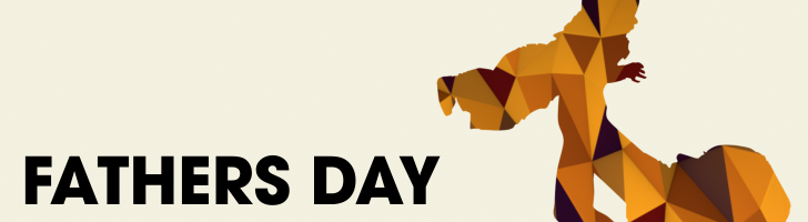 Silhouette of a father raising his child in the air