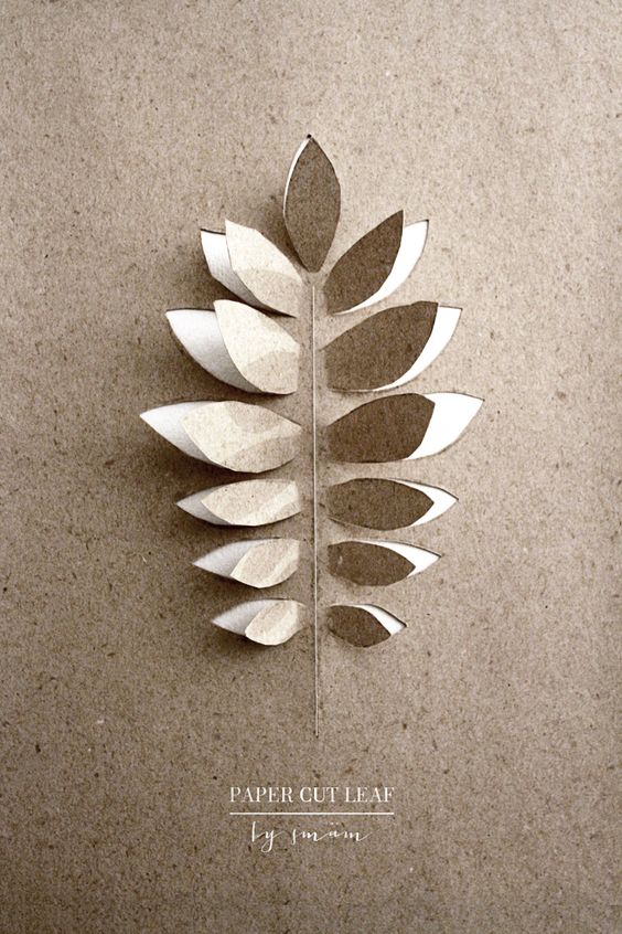A palm frond cut from a piece of thick construction paper.