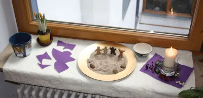 A window sill decorated in purple for Lent