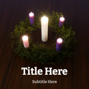 Advent wreath with lit candles in purple and white, viewed from above against dark wood background